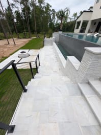 Pool terrace steps with cable railing