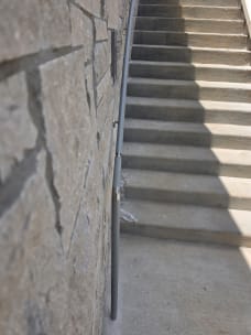 Exterior stair wall handrail