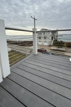 Deck corner cable railing