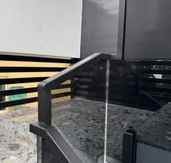 Glass railing cap rail fitting detail