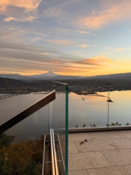 Glass railing on terrace overlooking river