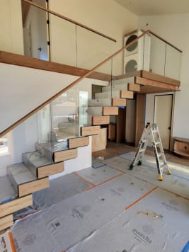Stack stair with glass and wood handrail