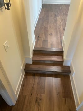 Walnut closed treads in hallway