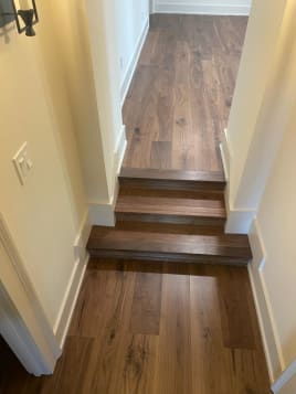 Walnut closed treads in hallway