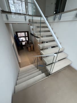 White oak floating stair with glass