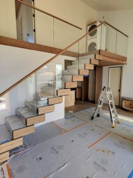 Stack stair with glass and wood handrail