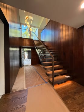 FLIGHT Mono stair with glass railing and LED-lit treads