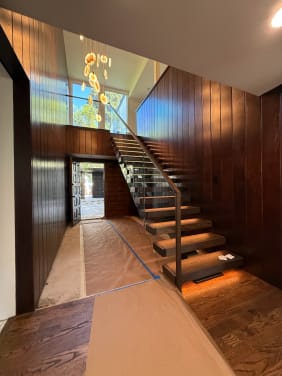 FLIGHT Mono stair with glass railing and LED-lit treads