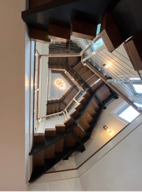 Multi-story stair with cable railing