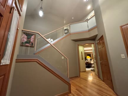 Frosted glass railing with wood cap