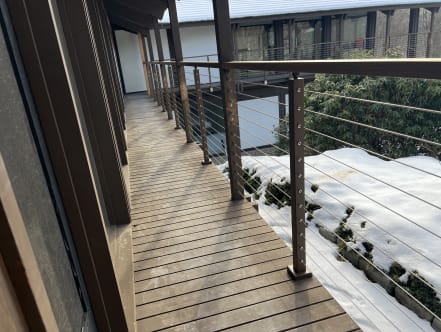 Cable railing on wraparound balcony