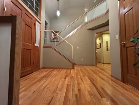 Frosted and clear glass railing with wood cap
