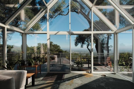 Sunroom with deck railing view