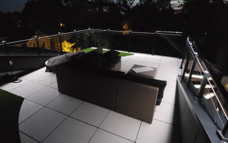 Rooftop cable railing at night