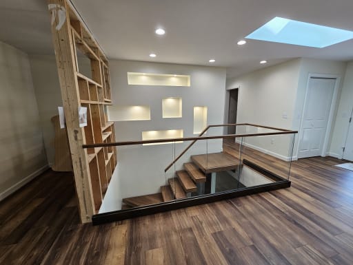 Glass base-rail around stair opening
