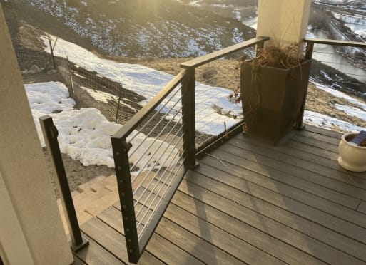 Cable railing gate on deck