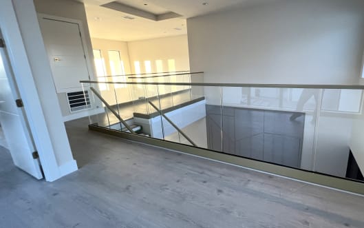 Champagne base rail glass with top cap lines a bright upper loft