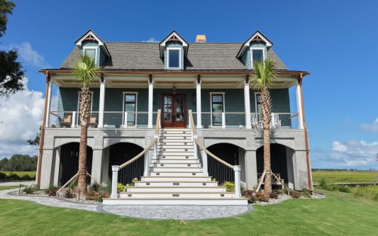Coastal home with cable railing