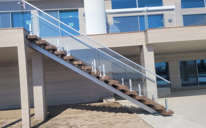 Exterior stainless mono stair with glass
