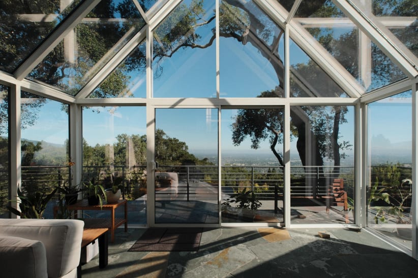 Sunroom with deck railing view